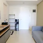 Homey And Comfy 2Br Apartment At Parahyangan Residence By Travelio
