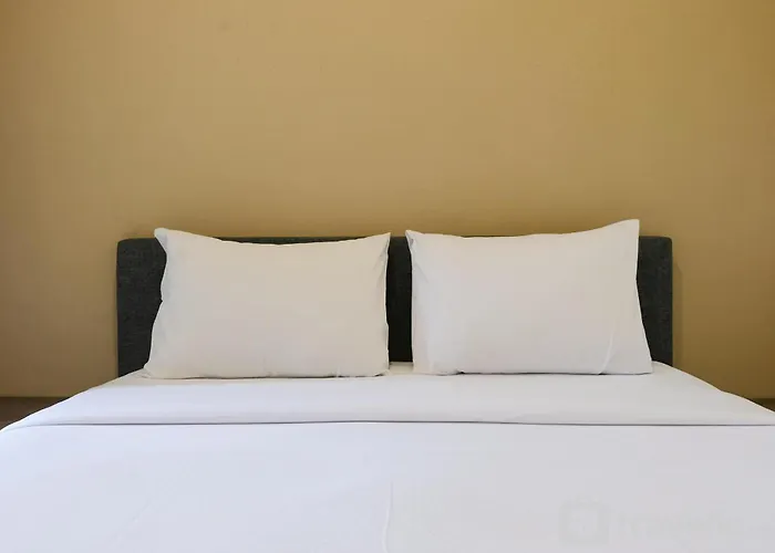Homey And Comfy 2Br Apartment At Parahyangan Residence By Travelio